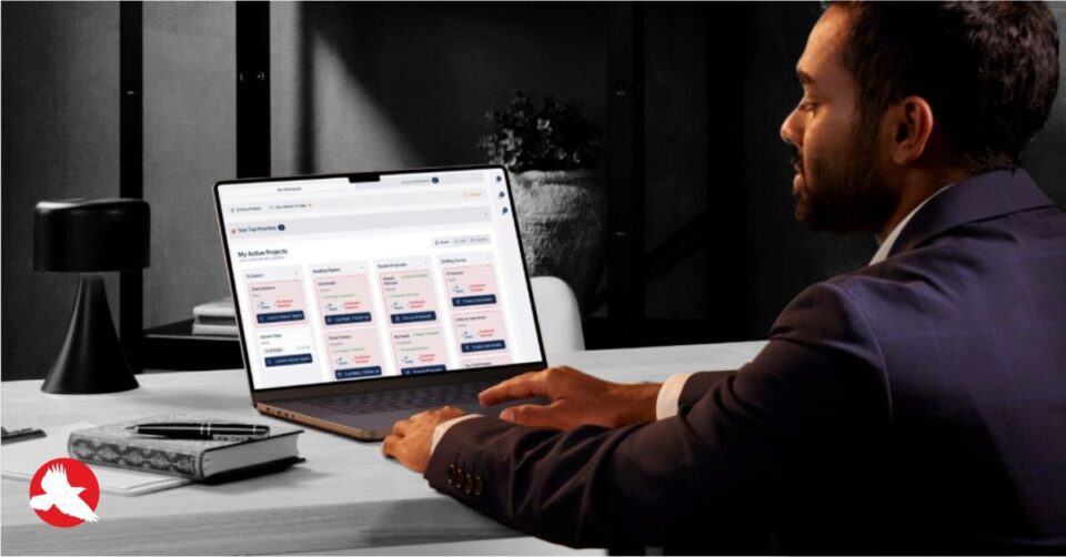 CEO sitting at a desk reviewing their Proof of Concept via a clickable prototype