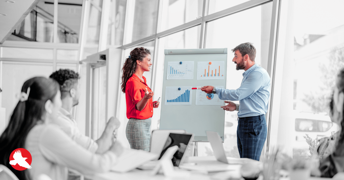 CIO presenting enterprise strategy to executive leadership team in a C-suite boardroom meeting