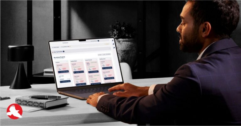 CEO sitting at a desk reviewing their Proof of Concept via a clickable prototype